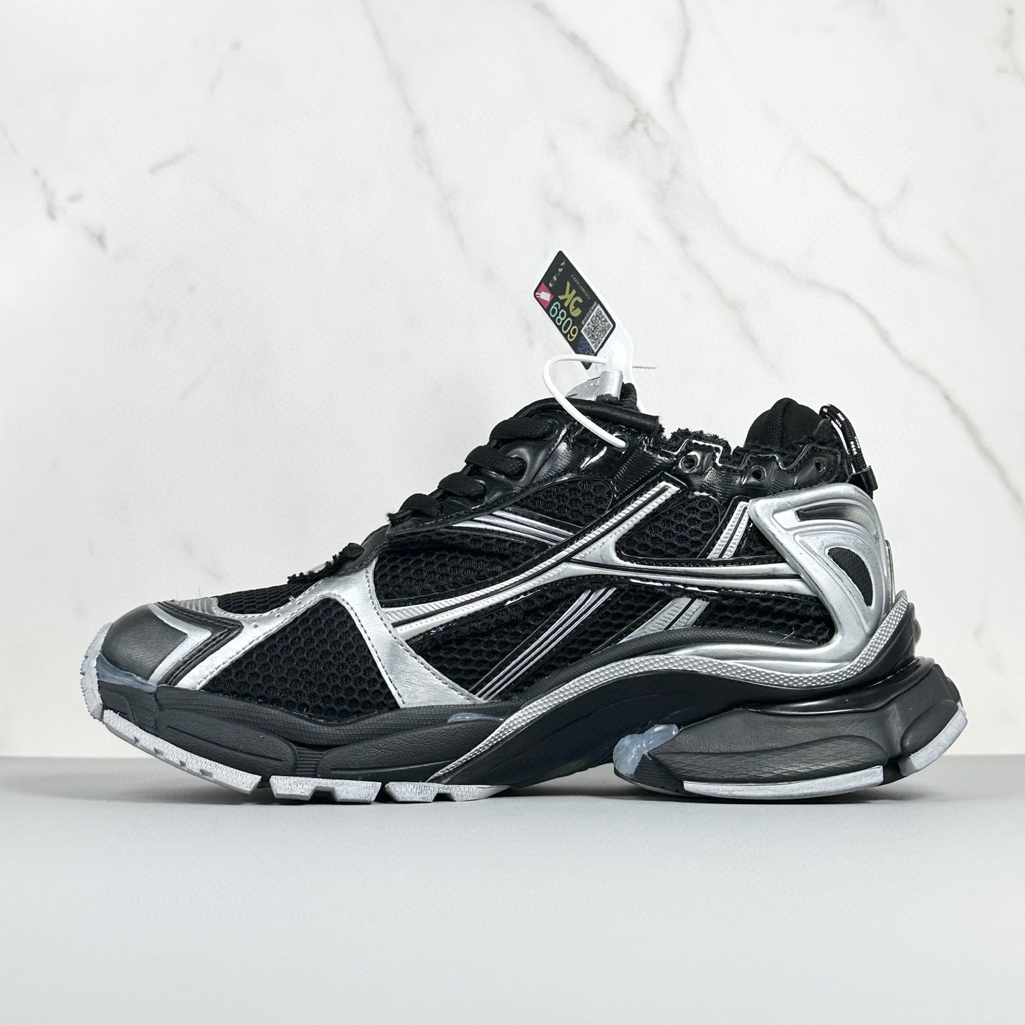 Runner Sneakers in Black / Silver